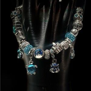 Elegant Silver and Blue Charm Bracelet